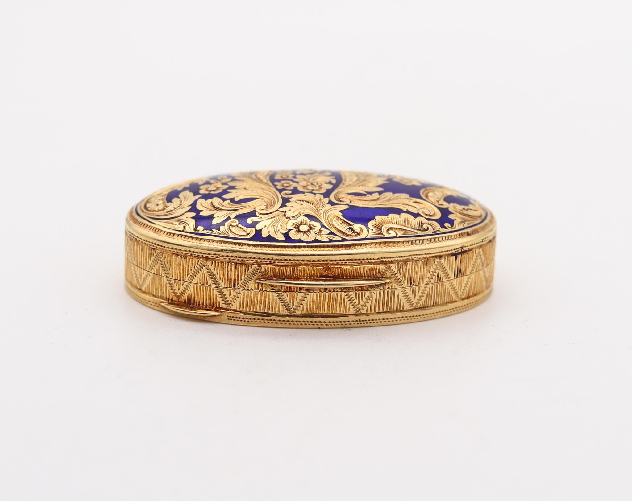 European pill box with blue enamel.

Gorgeous oval pill box, created in Europe back in the 1930. This box has been crafted in the baroque revival style, in solid yellow gold of 18 karats. The surface of the box is finished with chiseled and engraved