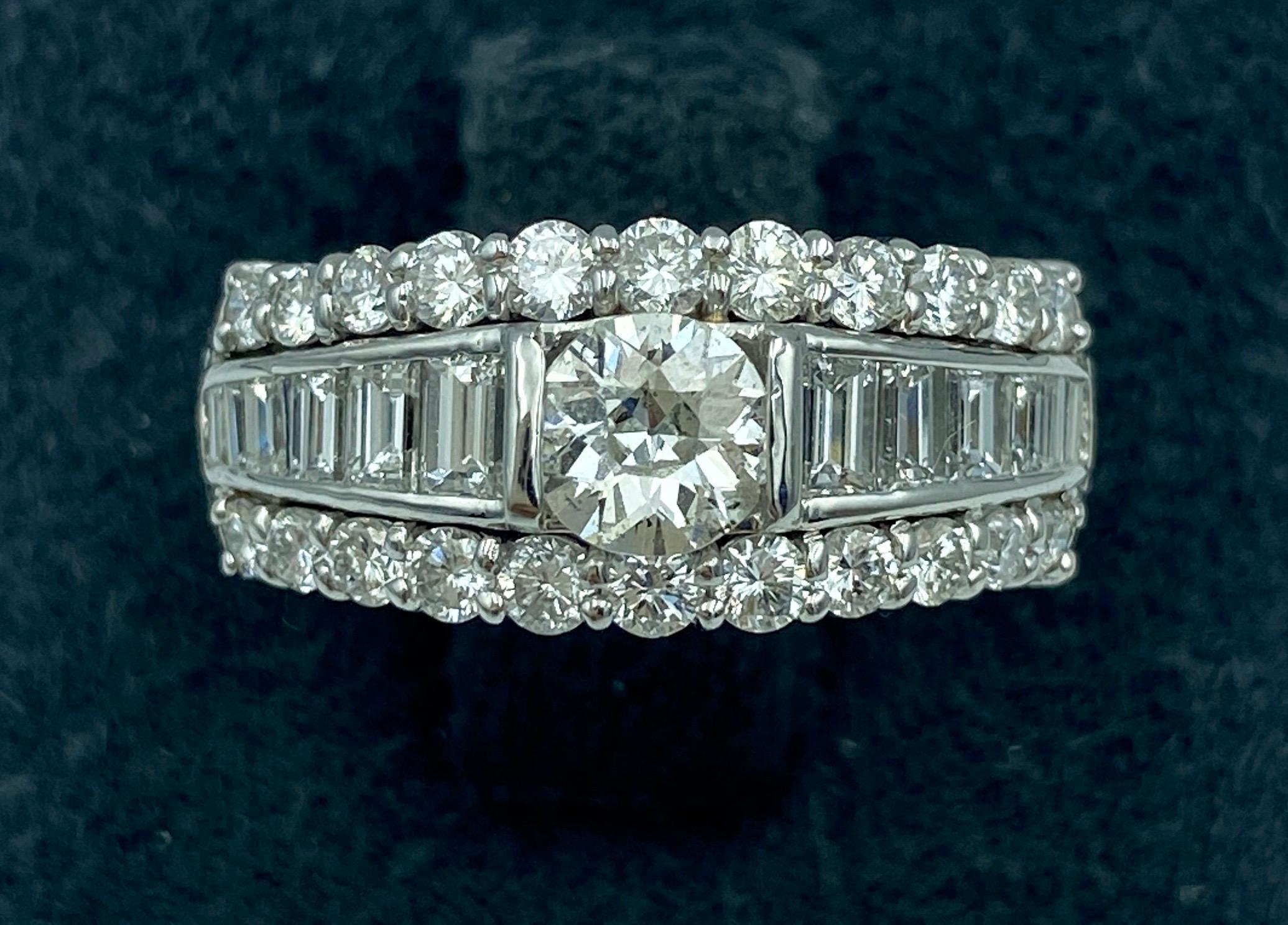 This beautifully made European 1970s platinum and diamond engagement ring has a centre stone of 0.54 carats and totals 1.33 carats in diamonds. The diamonds are VVS clarity and F-G colour. The quality of the diamonds together with the superior
