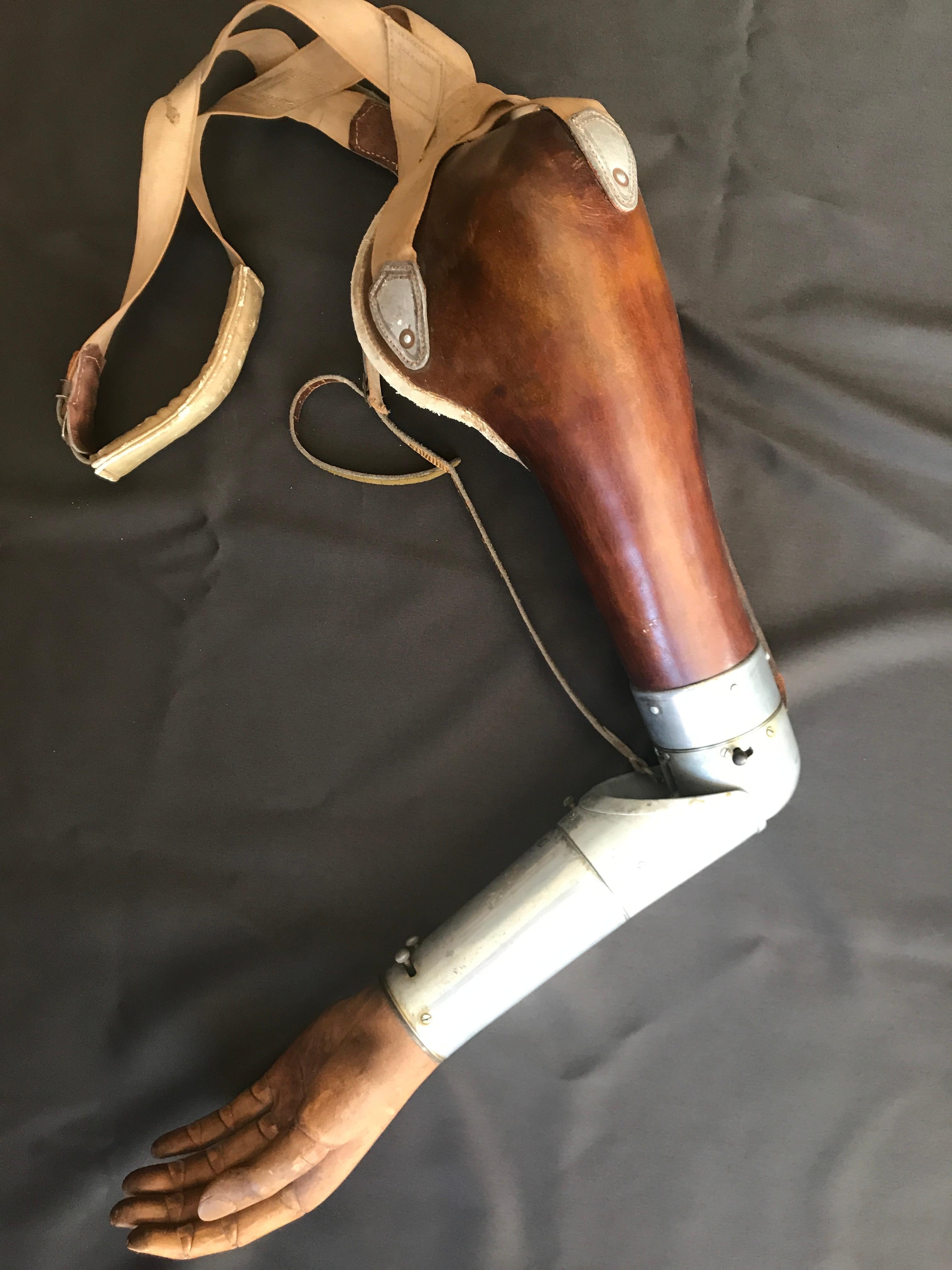 A fine medical collectable, this is a superb example of a vintage European false arm from the early 20th century. Finely constructed with pulleys ,switches and joints to allow the wearer to have a number of movements.
The hand is carved beechwood ,