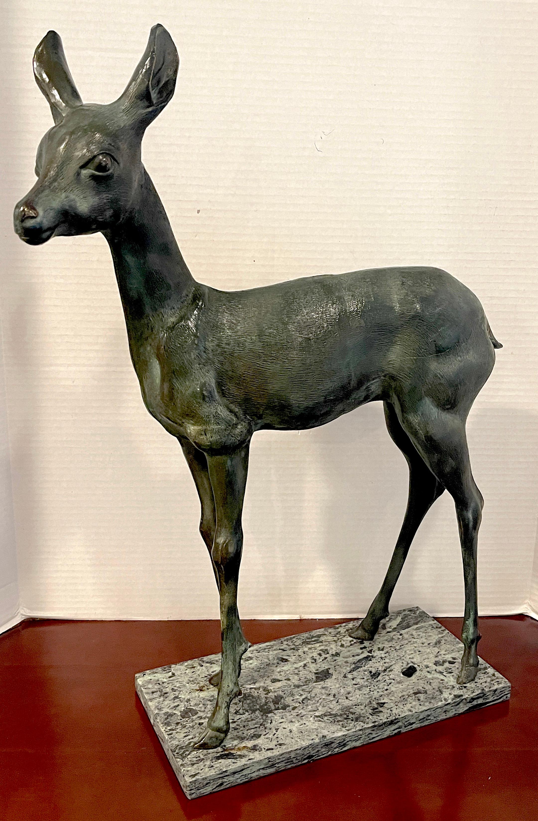European Art Deco bronze of a standing fawn, a good size well cast model of a standing fawn, bears numerous illegible stamps/foundry marks, with 'M.M' clearly visible. (Refer to the last photograph) Probably of French or Austrian origin The