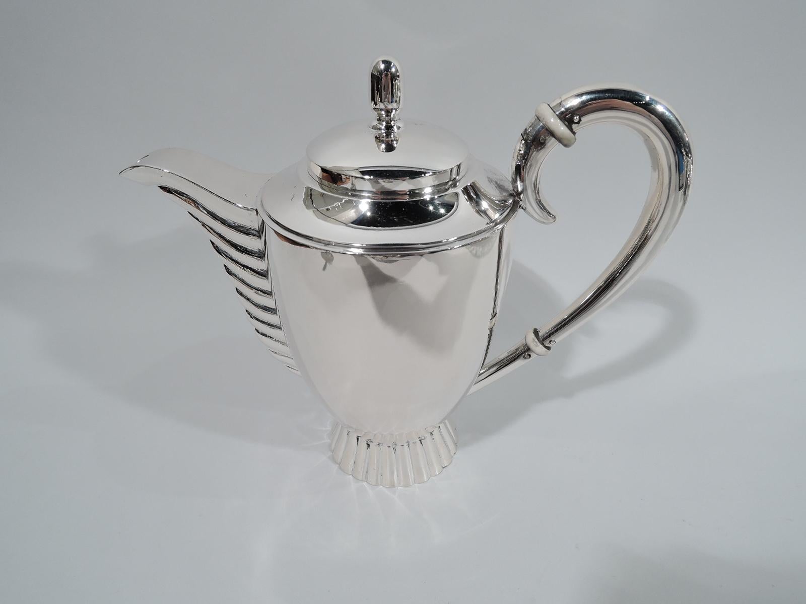 European Art Deco 835 silver 3-piece coffee set, circa 1925. This set comprises coffeepot, creamer, and sugar. Coffeepot: Ovoid body with high-looping handle, sinuous spout above graduated lobing, and side-hinged cover with stylized acorn finial;
