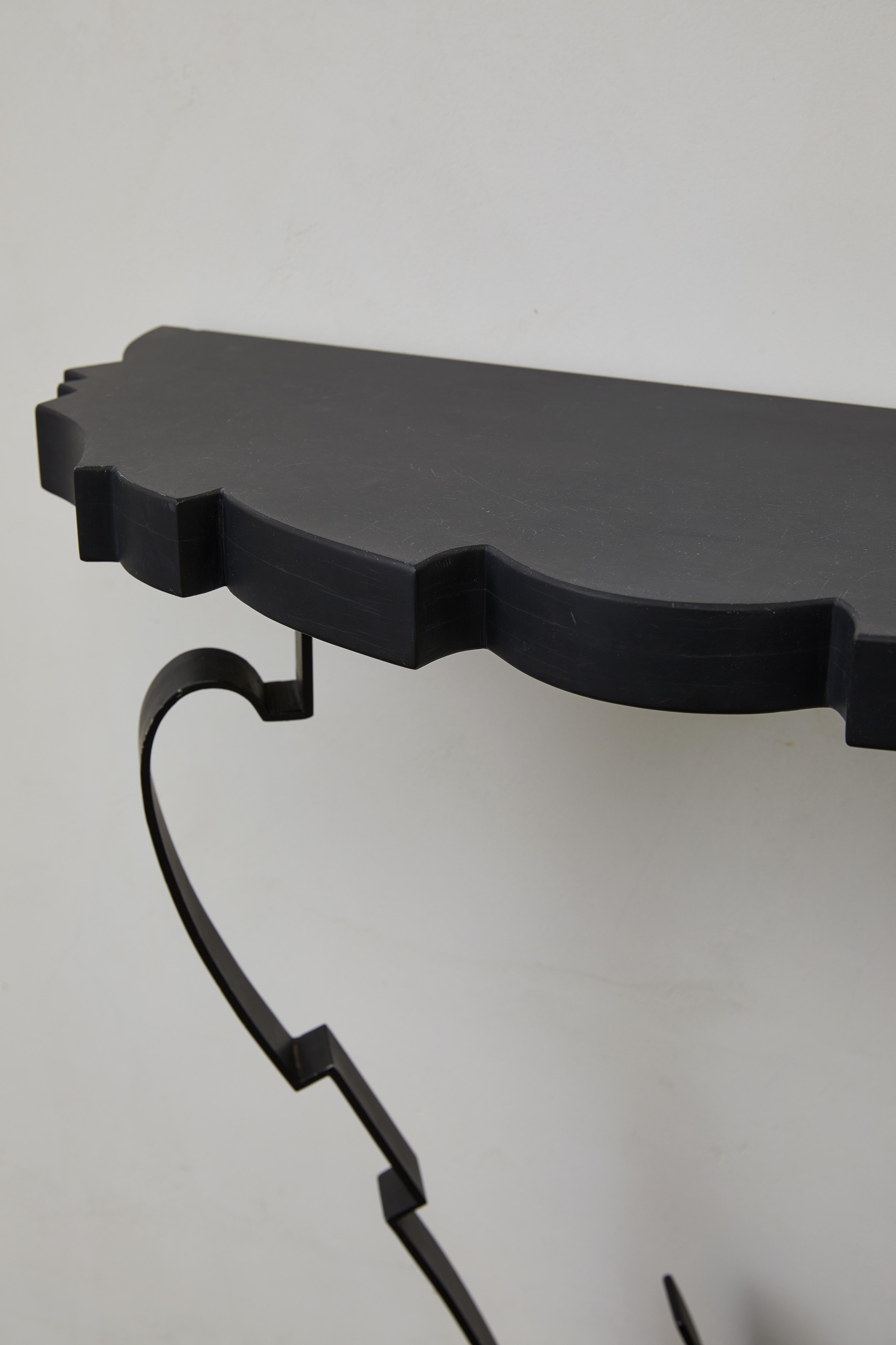 20th Century European Art Deco-Inspired Granite Top Console Table with Wall-Mounted Black Iro For Sale