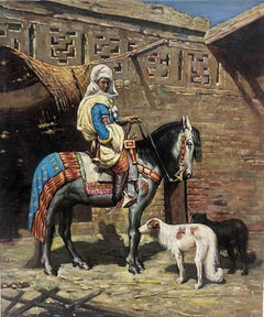 Scène orientaliste nord-africaine Homme à cheval avec des chiens devant un bâtiment de la ville