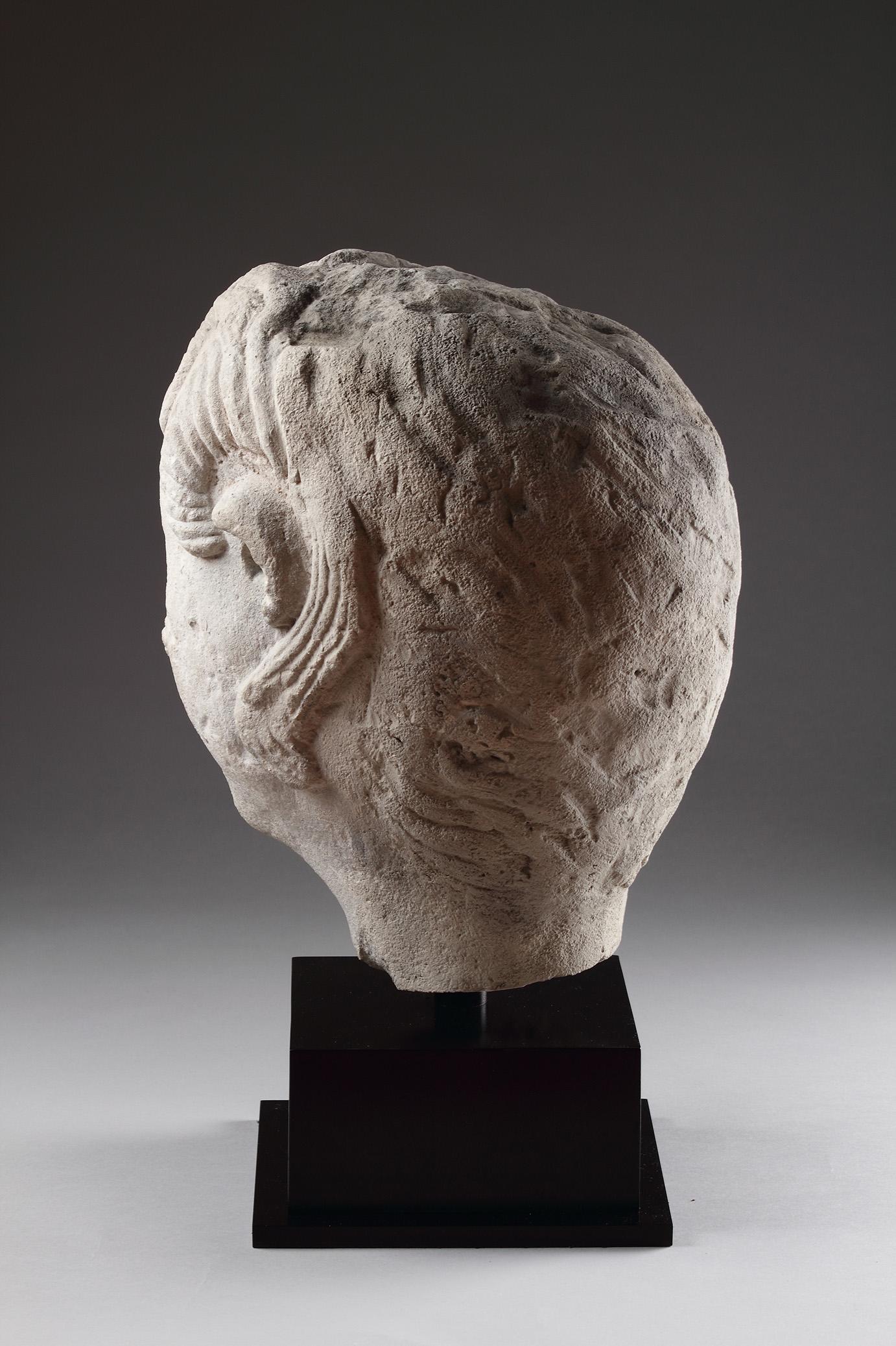 European Carved Limestone Celtic Votive Head of a Male Warrior In Good Condition For Sale In London, GB