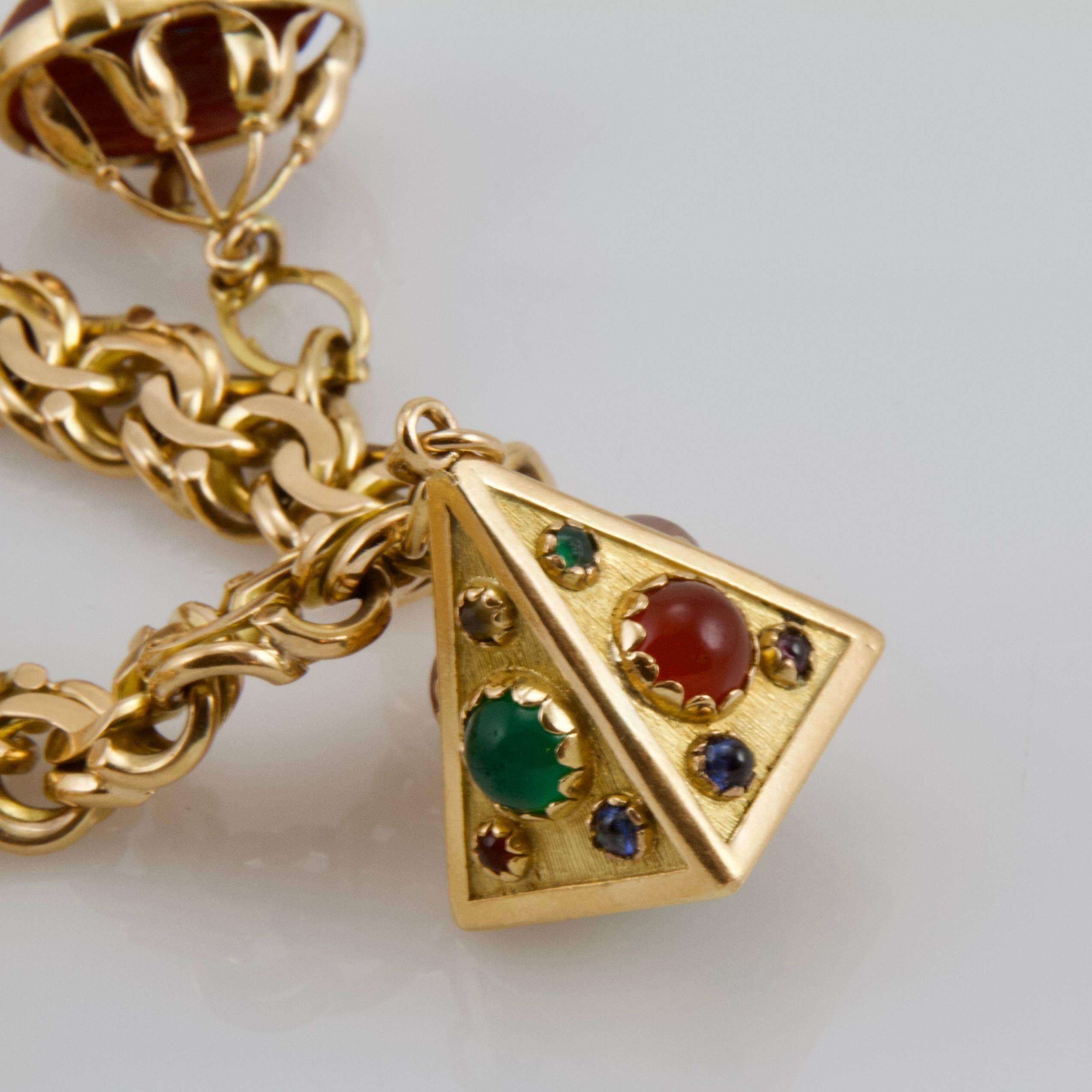 European Charming Large Yellow Gold Charms Bracelet In Fair Condition In Paris, FR