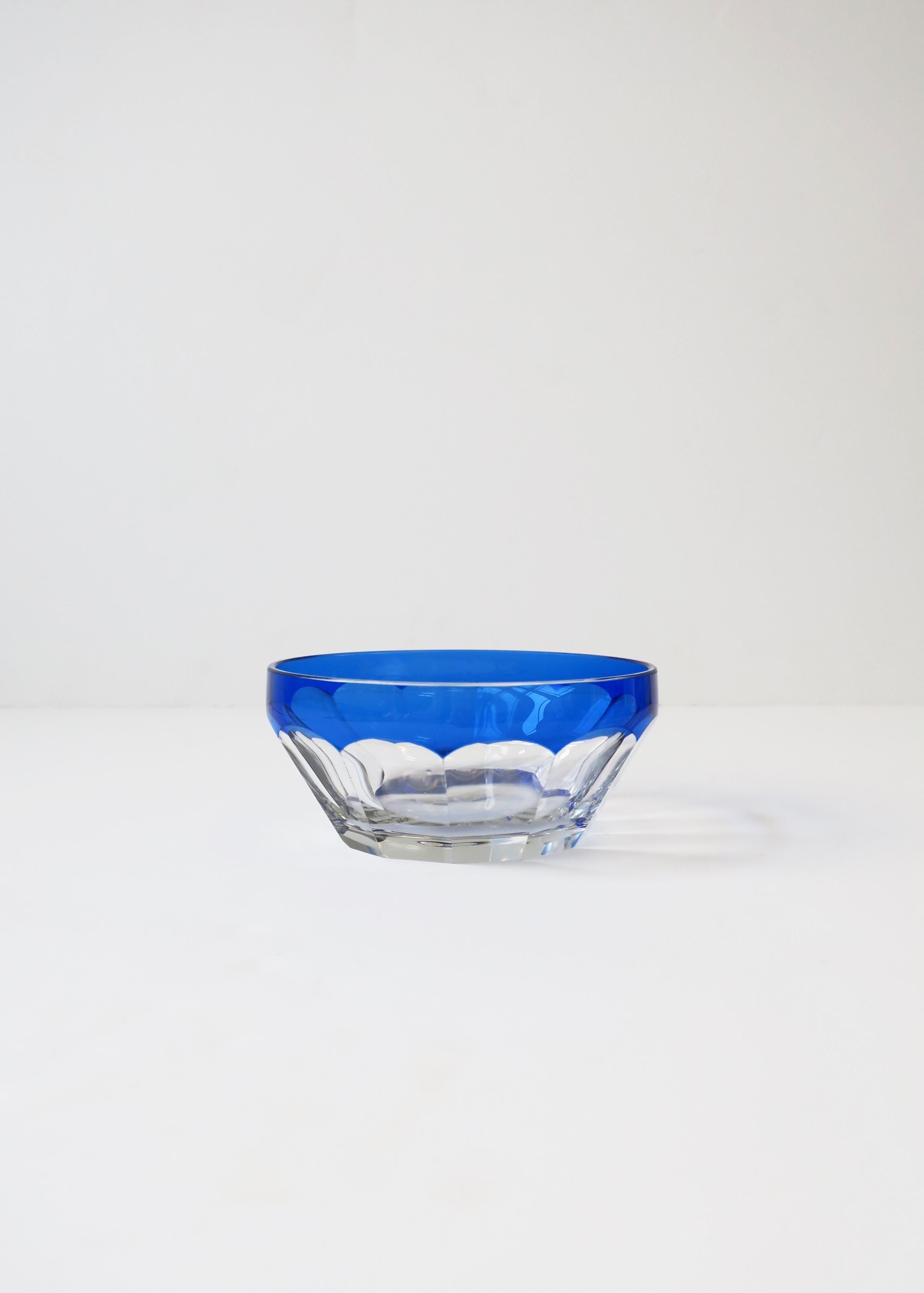 A very beautiful European cobalt blue and clear crystal bowl in the style of Bohemian crystal from luxury brand Moser. Bowl has beautiful details accentuating its cobalt blue hue as show in images. 

Bowl measures: 5