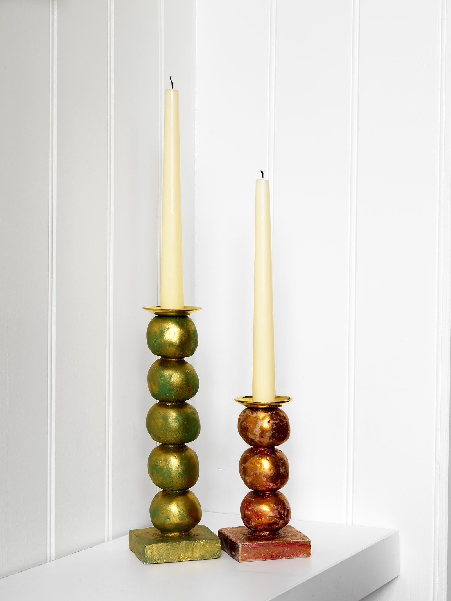Margit Wittig has used her sculptural skills to create beautifully-crafted, well-proportioned contemporary candlesticks, which are compositions of her unique signature pearl-shaped designs.

Each candlestick begins as hand-sculpted spheres which
