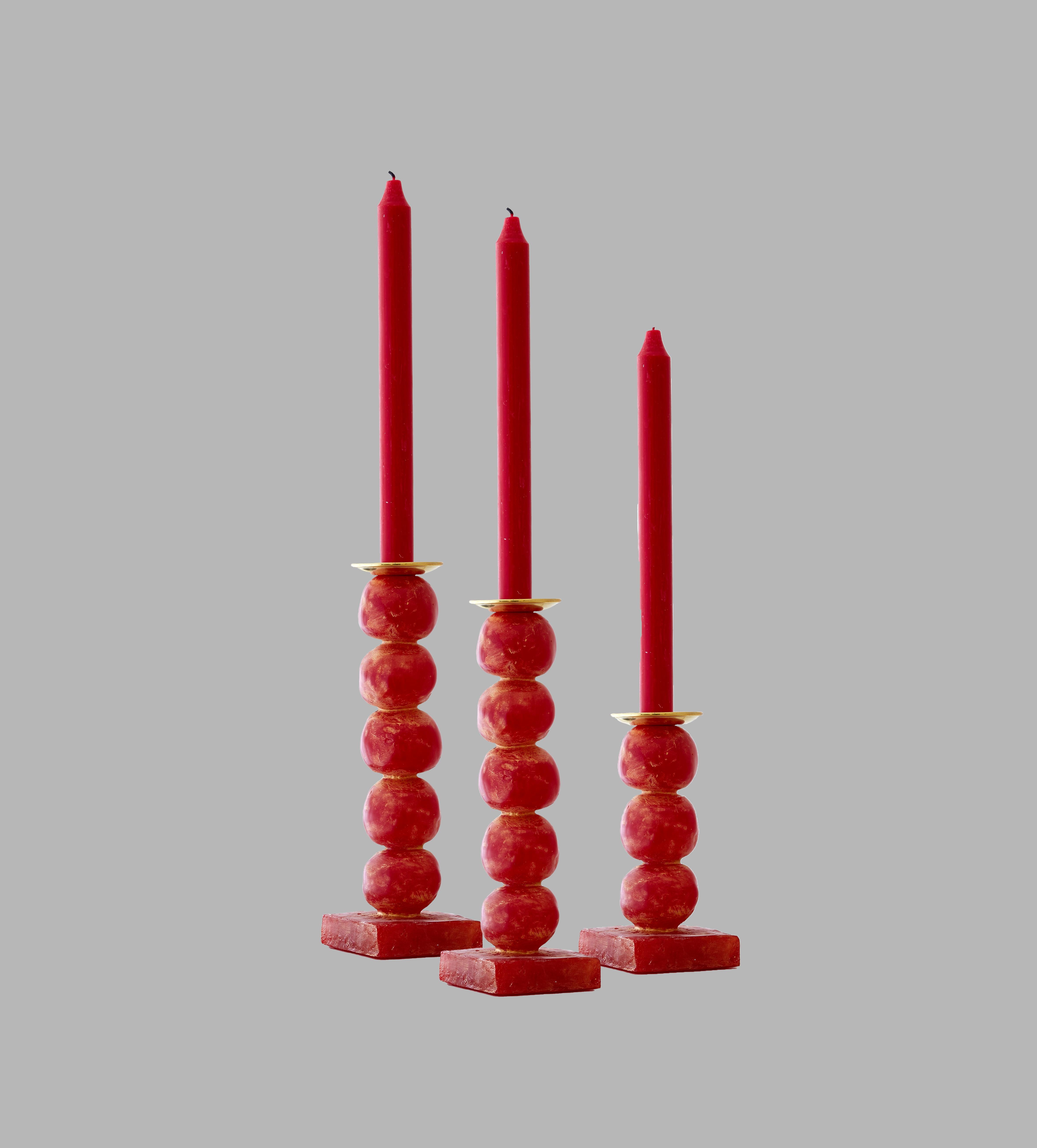 Margit Wittig has used her sculptural skills to create beautifully-crafted, well-proportioned contemporary candlesticks, which are compositions of her unique signature pearl-shaped designs.

Each candlestick begins as hand-sculpted spheres which are