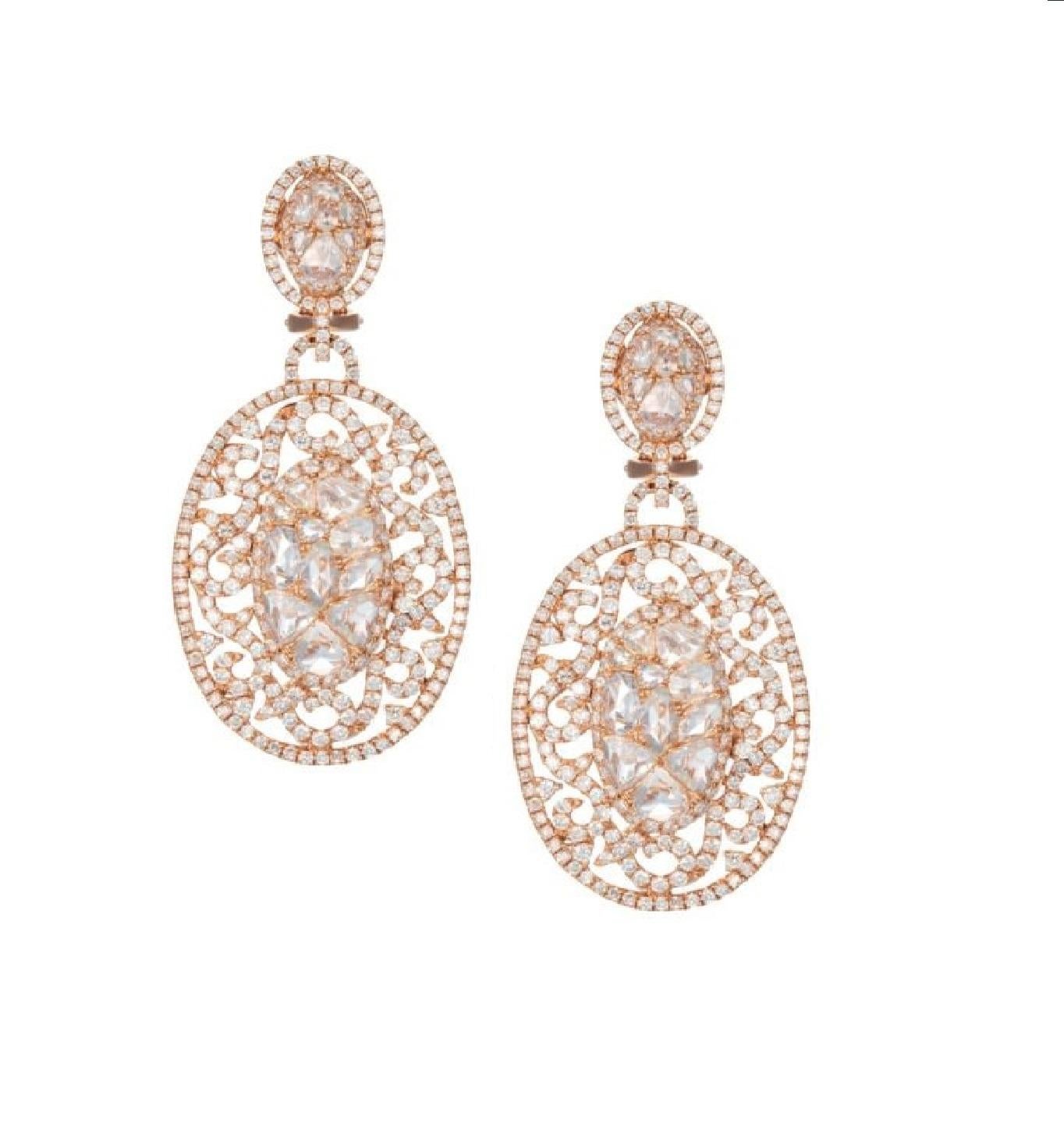 European Cut Diamond Dangle Earrings in Rose Gold
European cut diamond dangle earrings
18K rose gold dangle earrings with 8.50 carats of European cut diamonds and brilliant cut diamonds. 
Diamond specifications:

F/G color, SI clarity

This product