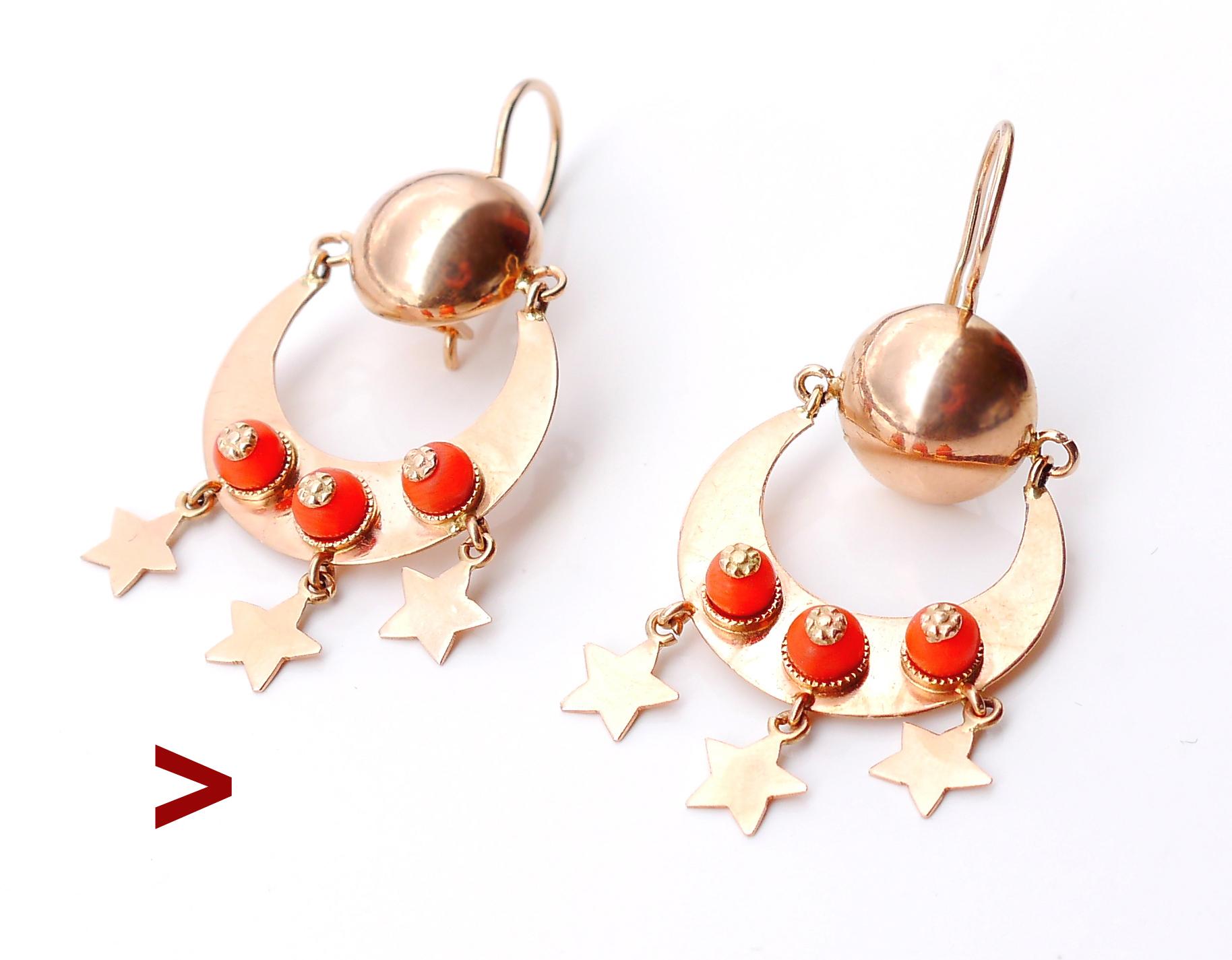 A pair in solid 14K Rose Gold with suspended and moving crescents decorated with natural / untreated Red Precious Coral settings and five - pointed Stars pendants.

Each of 6 Coral stones measures Ø 4 mm / ca. 0.5 ct. each / 3 ct total weight, color