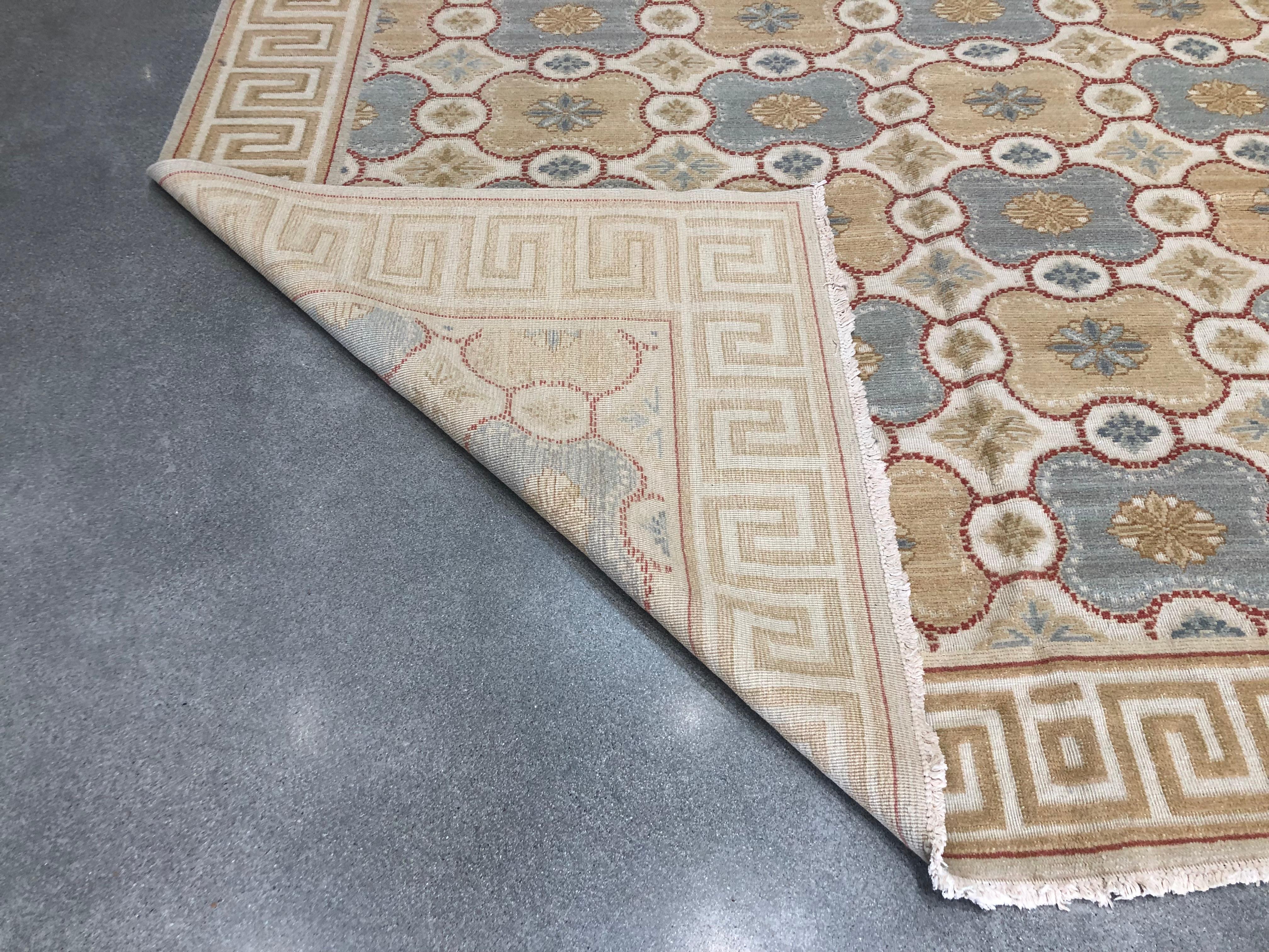 European design rug
Colors: Tan, cream, beige, brown, rust and green.