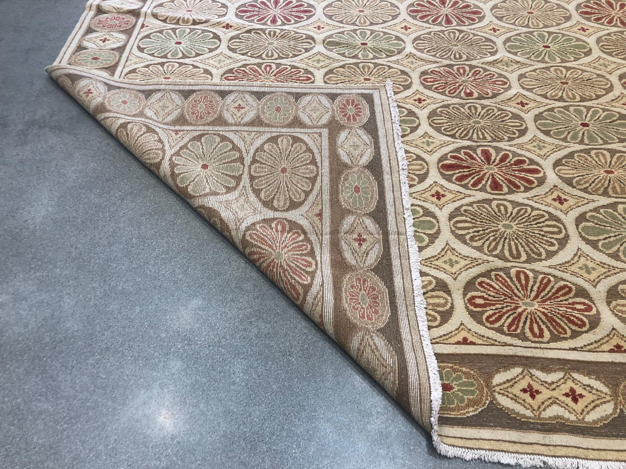 European design rug
Colors: Tan, cream, beige, brown, rust and green.