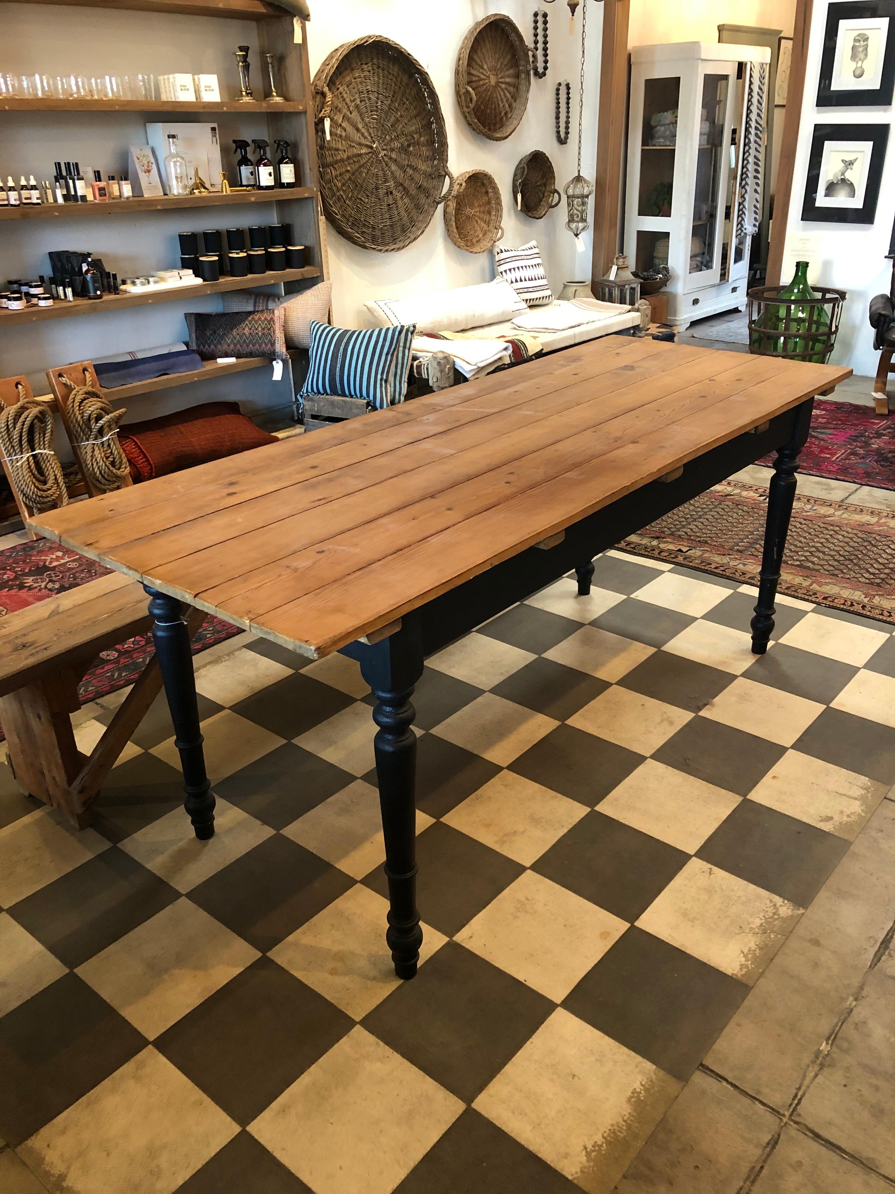 Vintage, rustic, European farm table with a newly painted dark grey base. The perfect dining table to add character to any space.