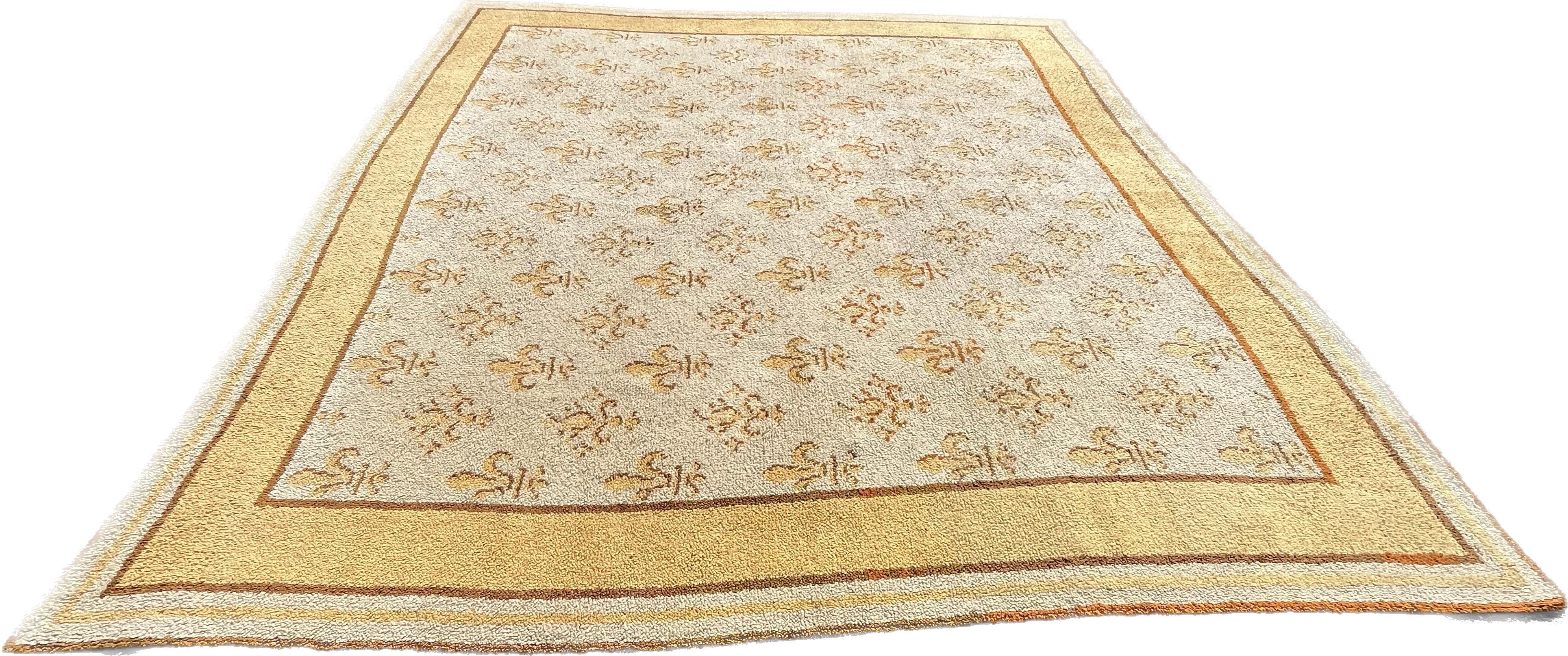 European Fleur De Lys Rug, circa 1900
The Fleur-de-Lys, Symbol of Royalty :

The King's Pavilion under the Ancien Régime. The flag of the Kingdom of France generally includes three fleur-de-lys, evoking the Holy Trinity as well as the theological