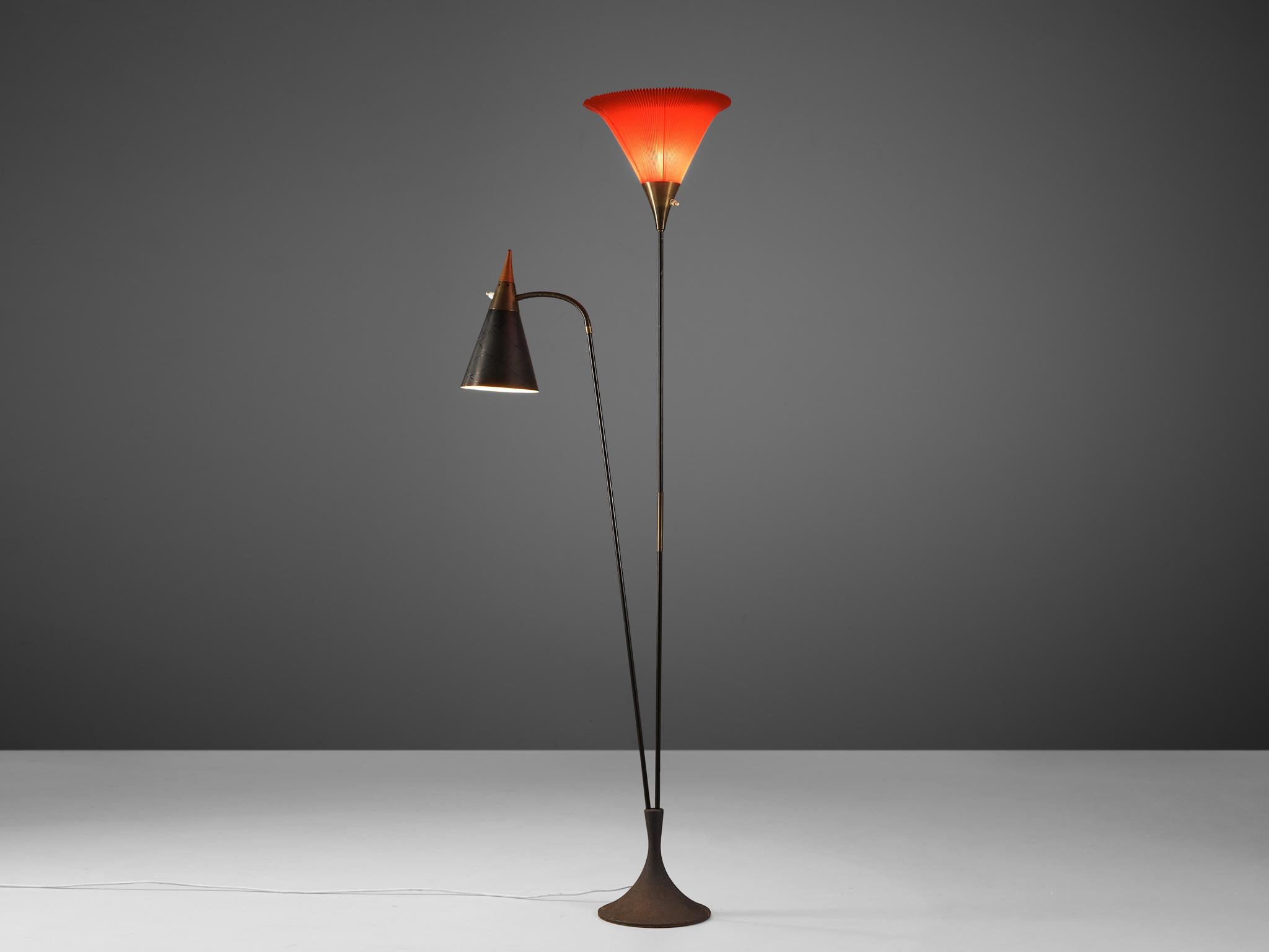 Floor lamp, metal, wood, plastic, Europe, 1960s

Wonderful functional floor lamp with two shades. The red shade in pleated design is facing towards the ceiling. A second shade in metal and wood functions as an adjustable reading light. The