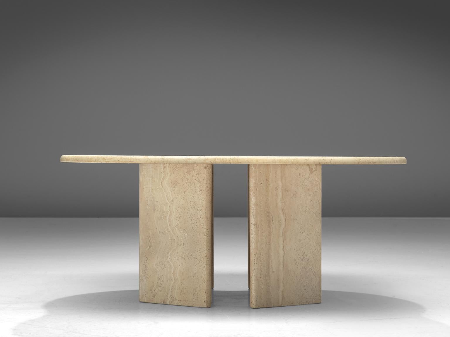 Coffee table, travertine, Europe, 1970s. 

Stunning coffee table with a clover shaped table top. The organic shaped table top forms a strong contrast with the angled, architectural base, consisting of two legs. It is a very architectural piece
