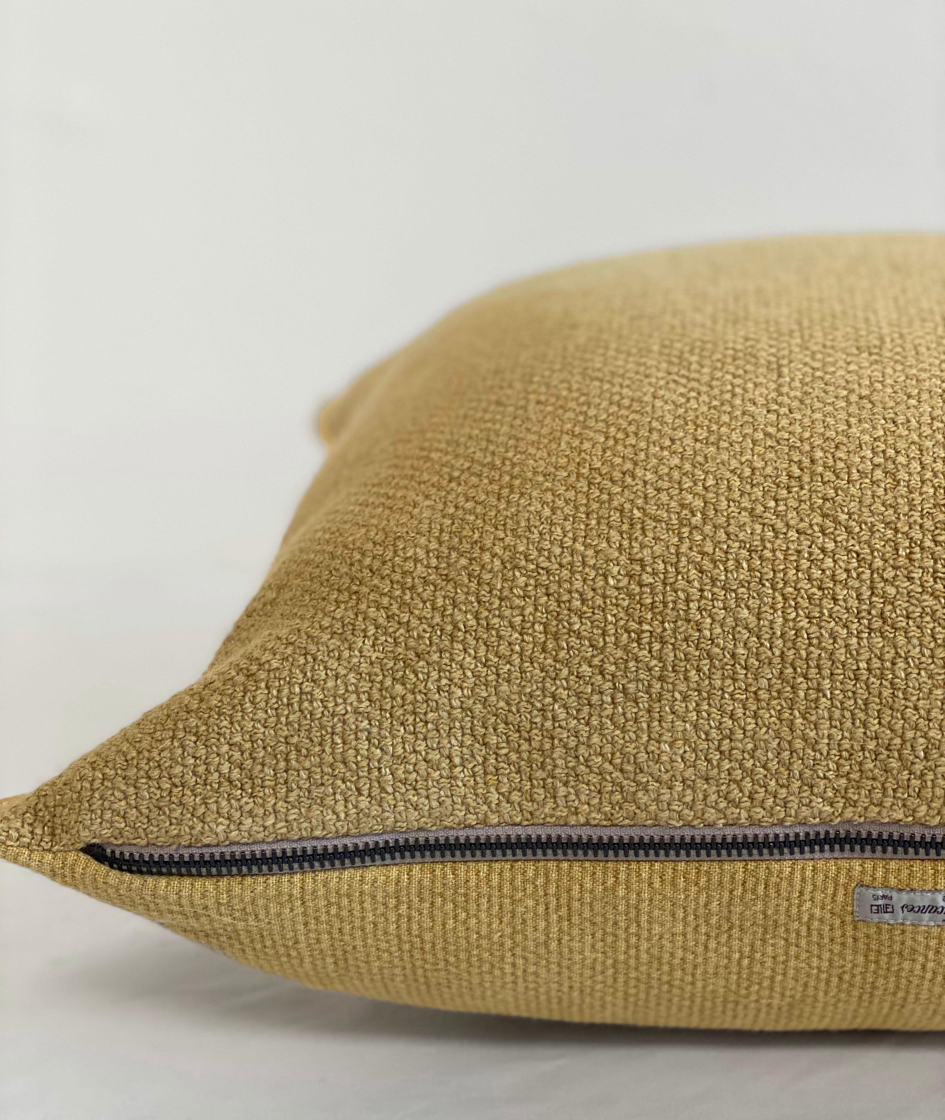 Gold Mustard colored linen blend accent pillow. Beautiful nubby soft texture with decorative edge.
Linen blend, with soft nubby texture. 
Size: 15 x 24
Down insert included
Metal zipper closure
Color: Paille (gold mustard tone).