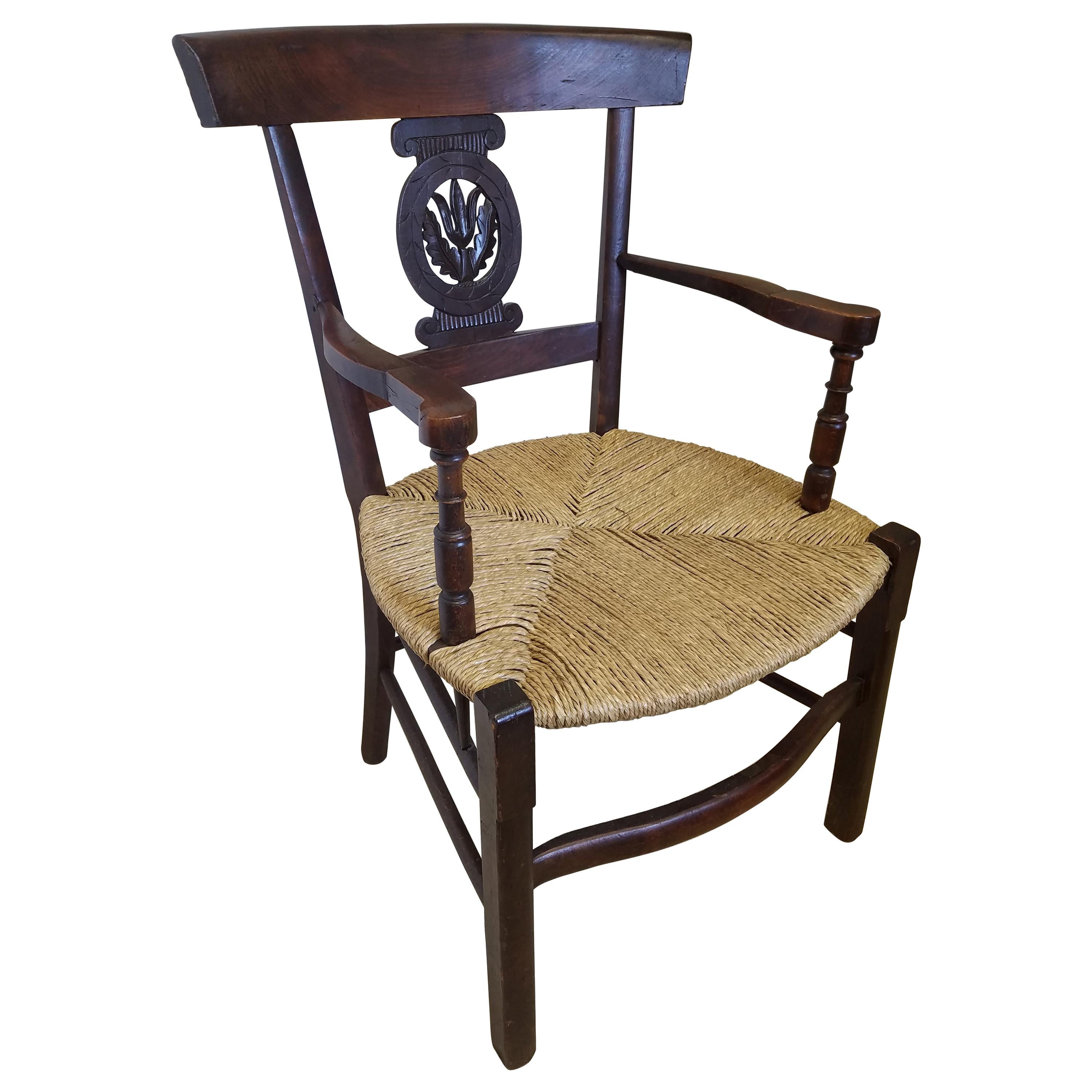 European Hand Carved Dark Oak Armchair with Rush Seat