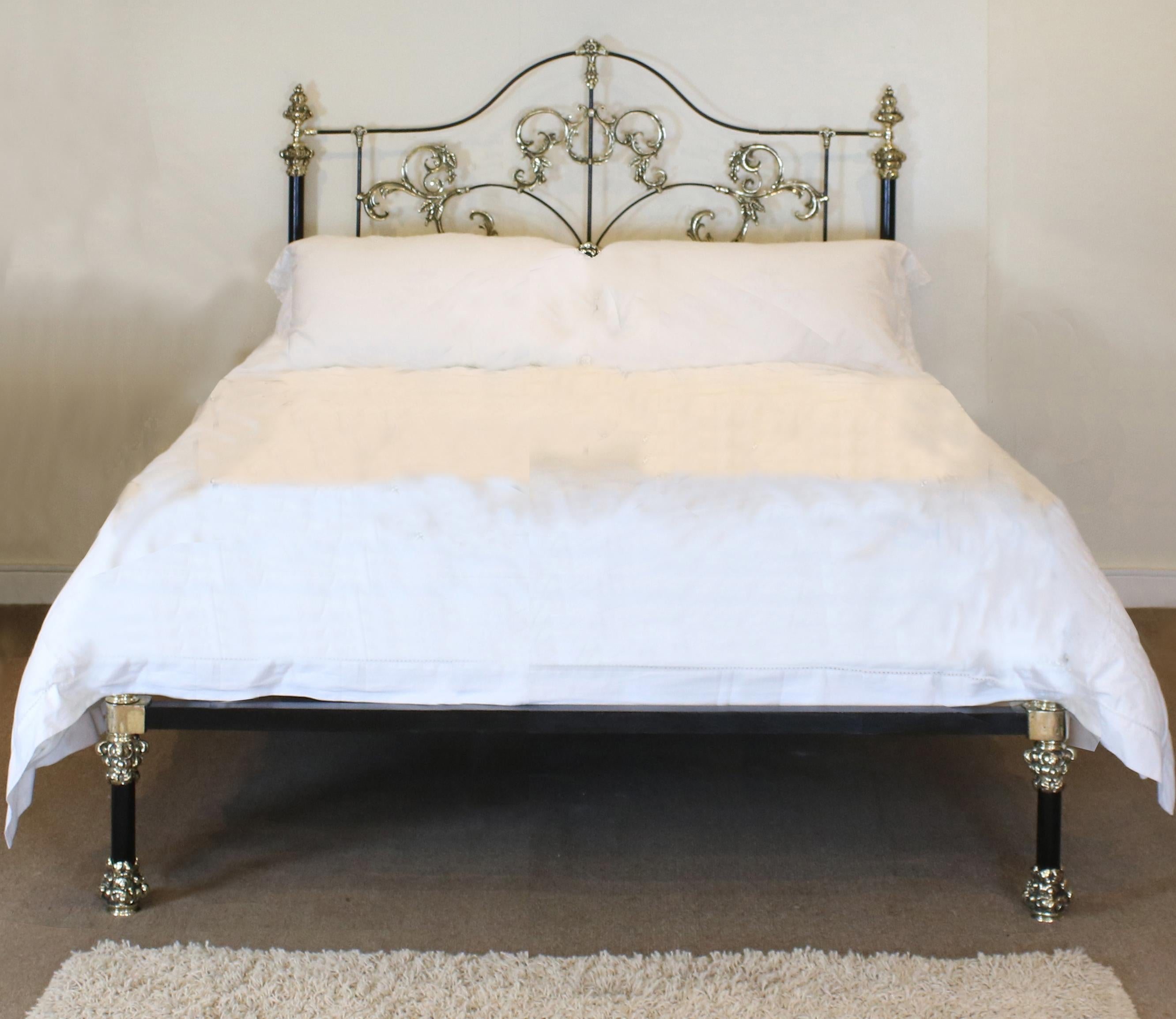 A stunning bespoke made-to-measure platform bed with decorative head panel having ornate brass castings, and low foot footboard with decorative feet.

The dimensions of this bed is European King Size to accept a 63 inches wide by 79 inches long box