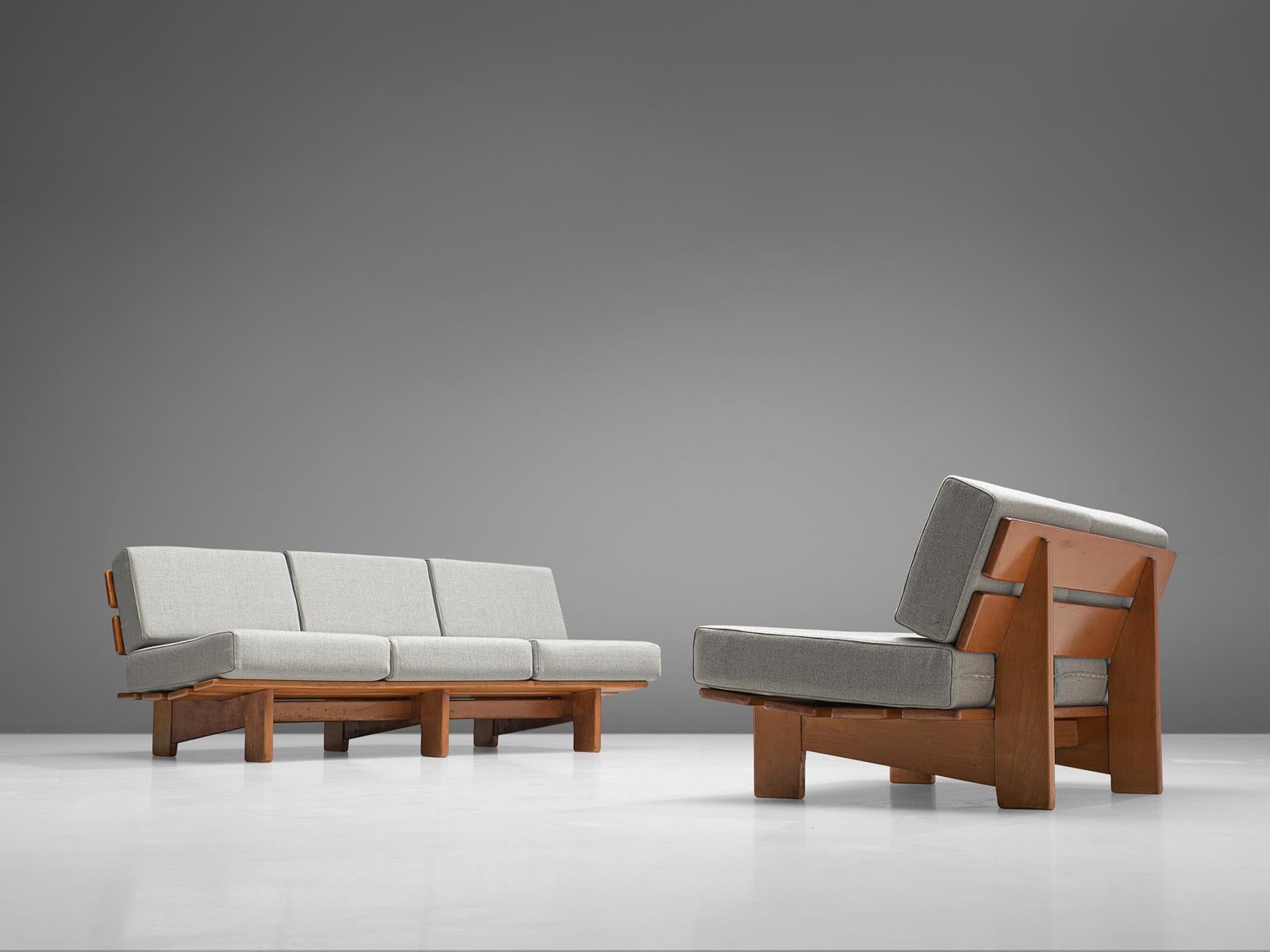 Three-seat sofa, oak and fabric, Europe, 1950s.

Modest and simplistic three-seat sofa made in the 1950s. This sofa is made of oak, the sofa is build up with two slats for the backrest and four as the seat. Comfortable grey cushions are placed on