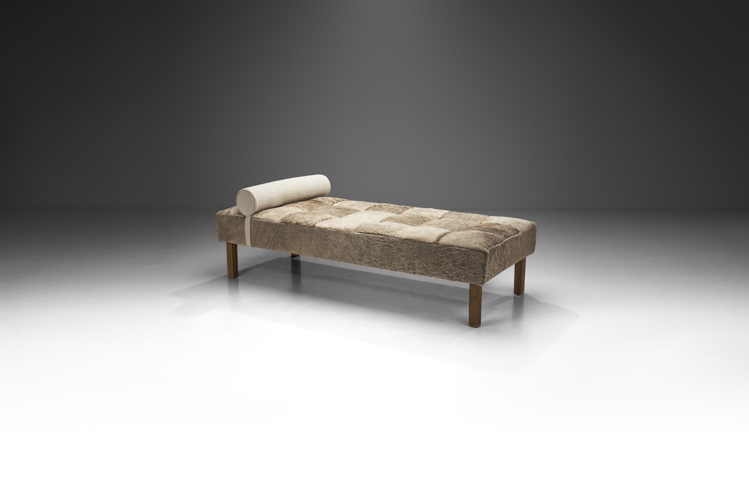 This gorgeous daybed was inspired by classic mid-century European furniture design and simplicity. Pieces from the mid-century era, like this daybed, are characterized by clarity in design and extremely high-quality craftsmanship and choice of