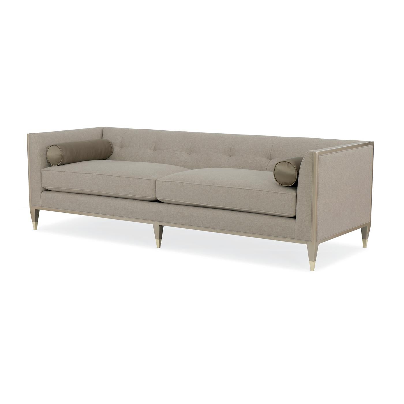 A European Mid-Century sofa. This smart sofa has a streamlined rectangular frame in Taupe Paint that completely surrounds this dapper piece.

Its Mid-Century Modern appeal has been updated with a low European profile, pristine tailoring and modern