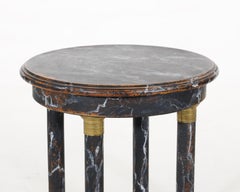 European pairs of black and white marble painted pedestals table, 20th C.