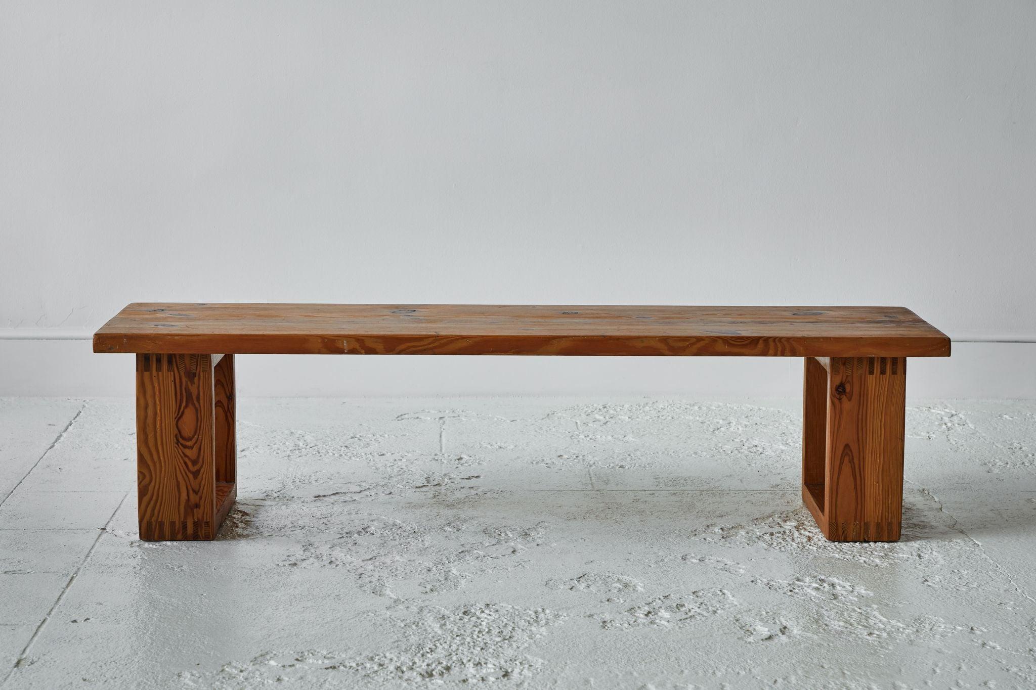 Beautiful European pine bench with squared leg support. The eye gravitates to the perfect proportions of this bench and natural pine. The detailed dovetail joints exhibit the craftsmanship. It will be a wonderful addition to any room.