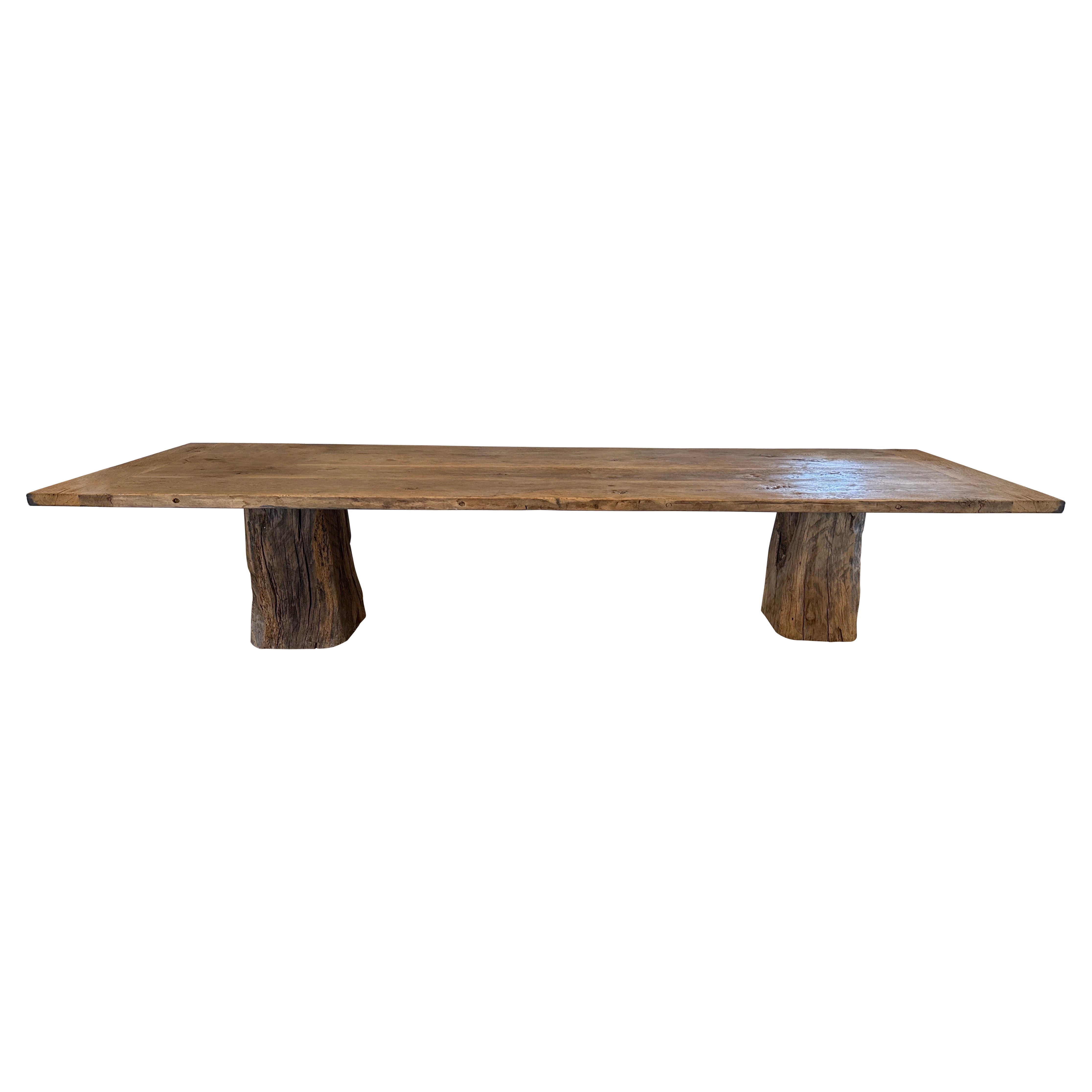 European Reclaimed Wooden Dining Table With Wooden Pedestal Legs.