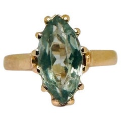 14k Green Oval Spinel Solitaire Ring in Marquise Shape in Warm Gold Setting