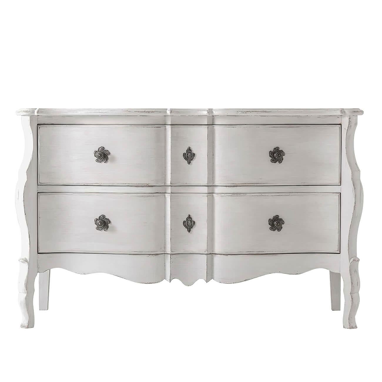 European distress painted rococo style serpentine dresser with a serpentine form molded edge top, and a scalloped apron and angled legs with swirl pewter antique style handles and escutcheons.

Dimensions: 52