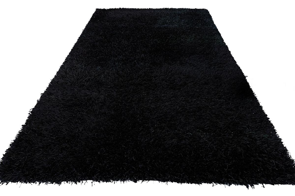 Europäischer Designerteppich - Minimalistische Eleganz in Tiefschwarz

Dieser atemberaubende europäische Designerteppich verkörpert mit seinem tiefschwarzen, monochromen Finish moderne Raffinesse. Das minimalistische Design konzentriert sich auf