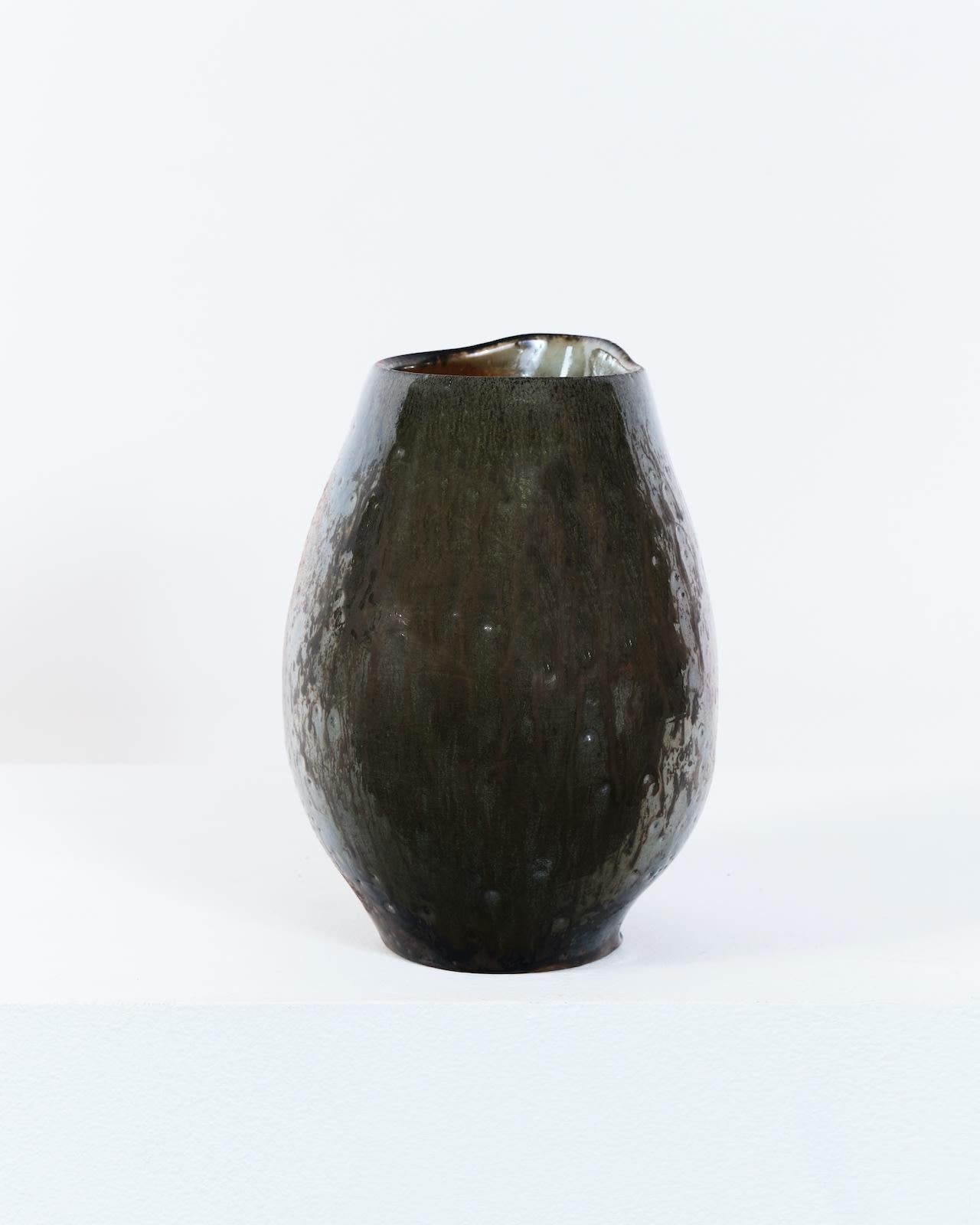 Gres cocido con madera
H18 x D12 cm