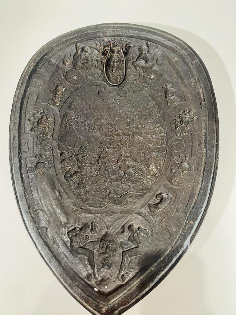 18th Century and Earlier European shield in bronze with careful chiseling depicting a battle circa 1700