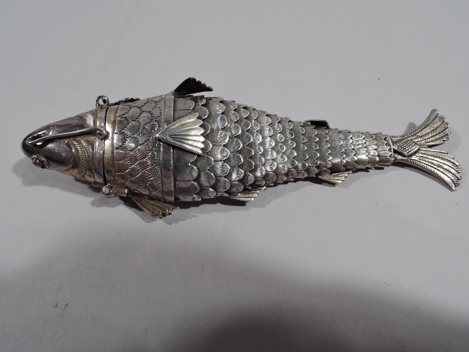 European parcel gilt silver figural vinaigrette, ca 1880. Fish form with imbricated scales and fins. Body reticulated and head hinged. Grill detachable with ornamental flowers. Marked.