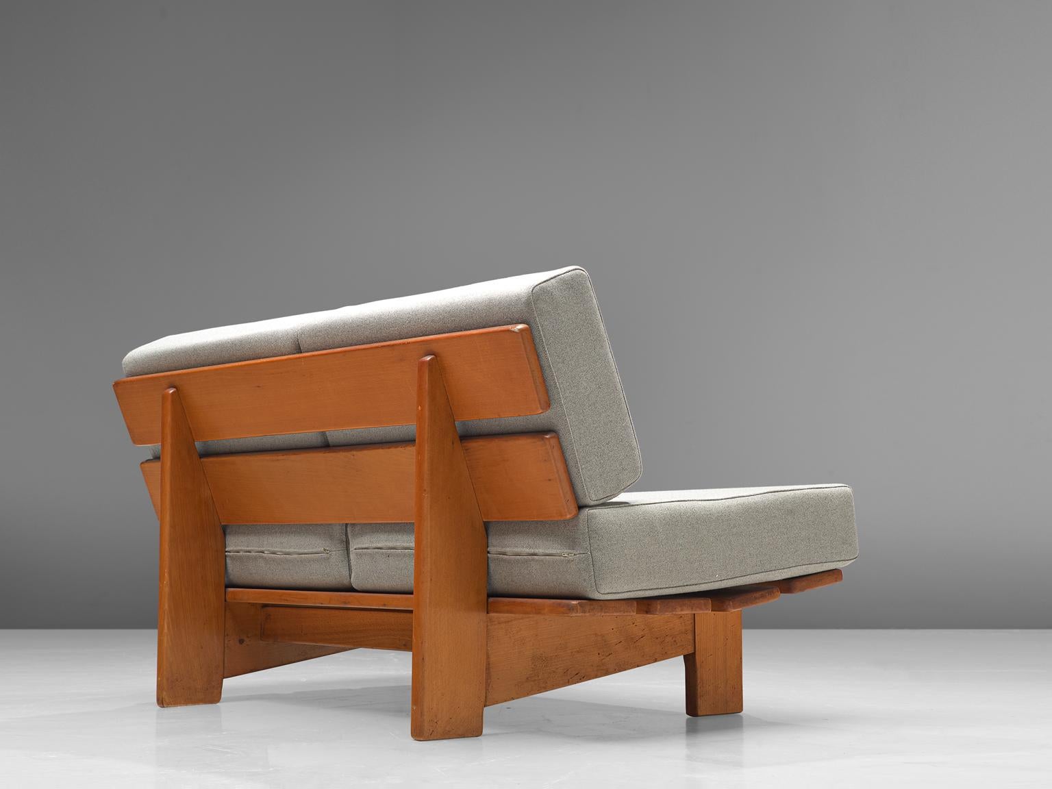 Two-seat sofa, oak and fabric, Europe, 1950s.

Modest and simplistic sofa bench made in the 1950s. This sofa is made of oak, the sofa is build up with two slats for the backrest and four as the seat. Comfortable grey cushions are placed on the top,