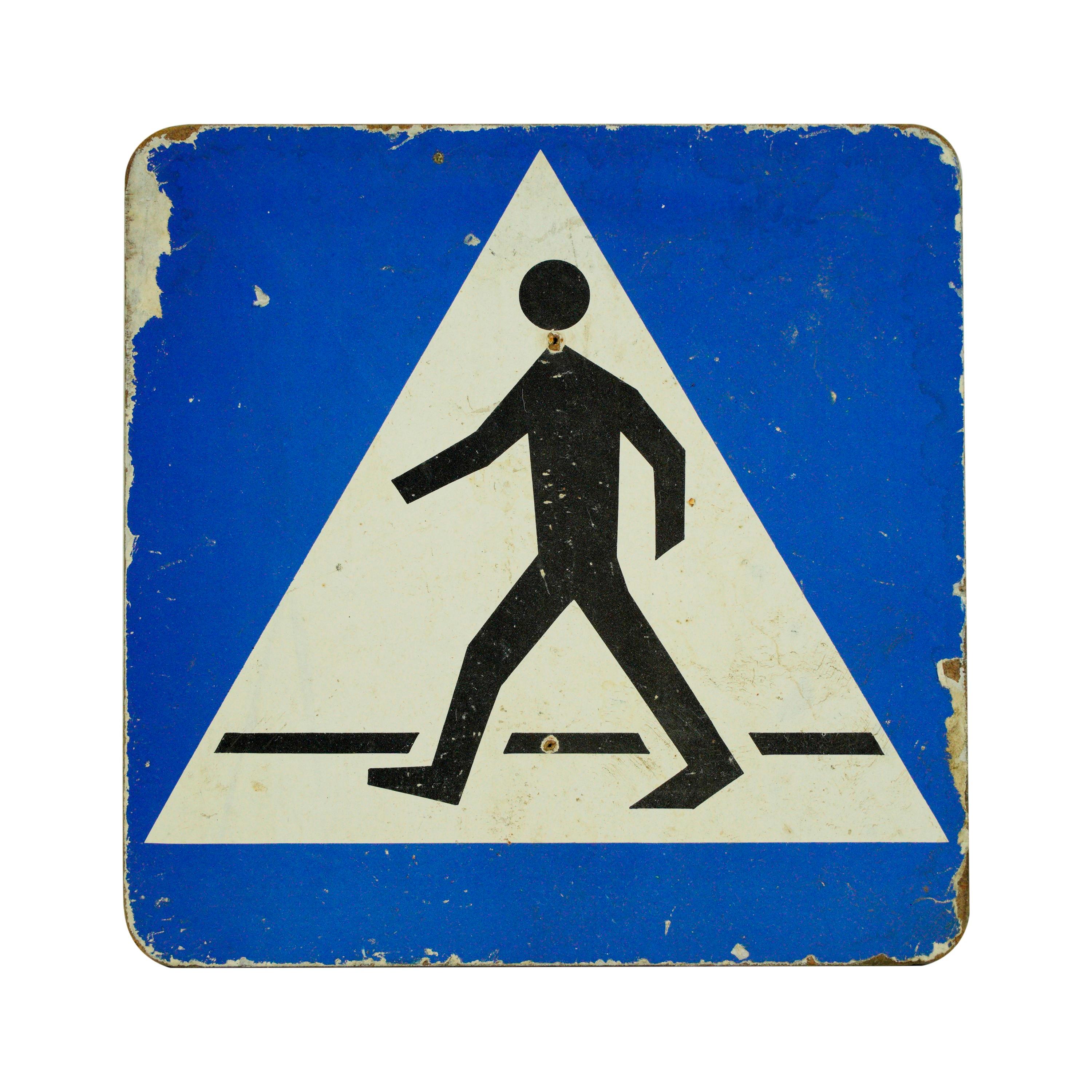 This European cardboard pedestrian sign is blue, white, and black in color. Good condition with appropriate wear from age. One available. Please note, this item is located in our Scranton, PA location.