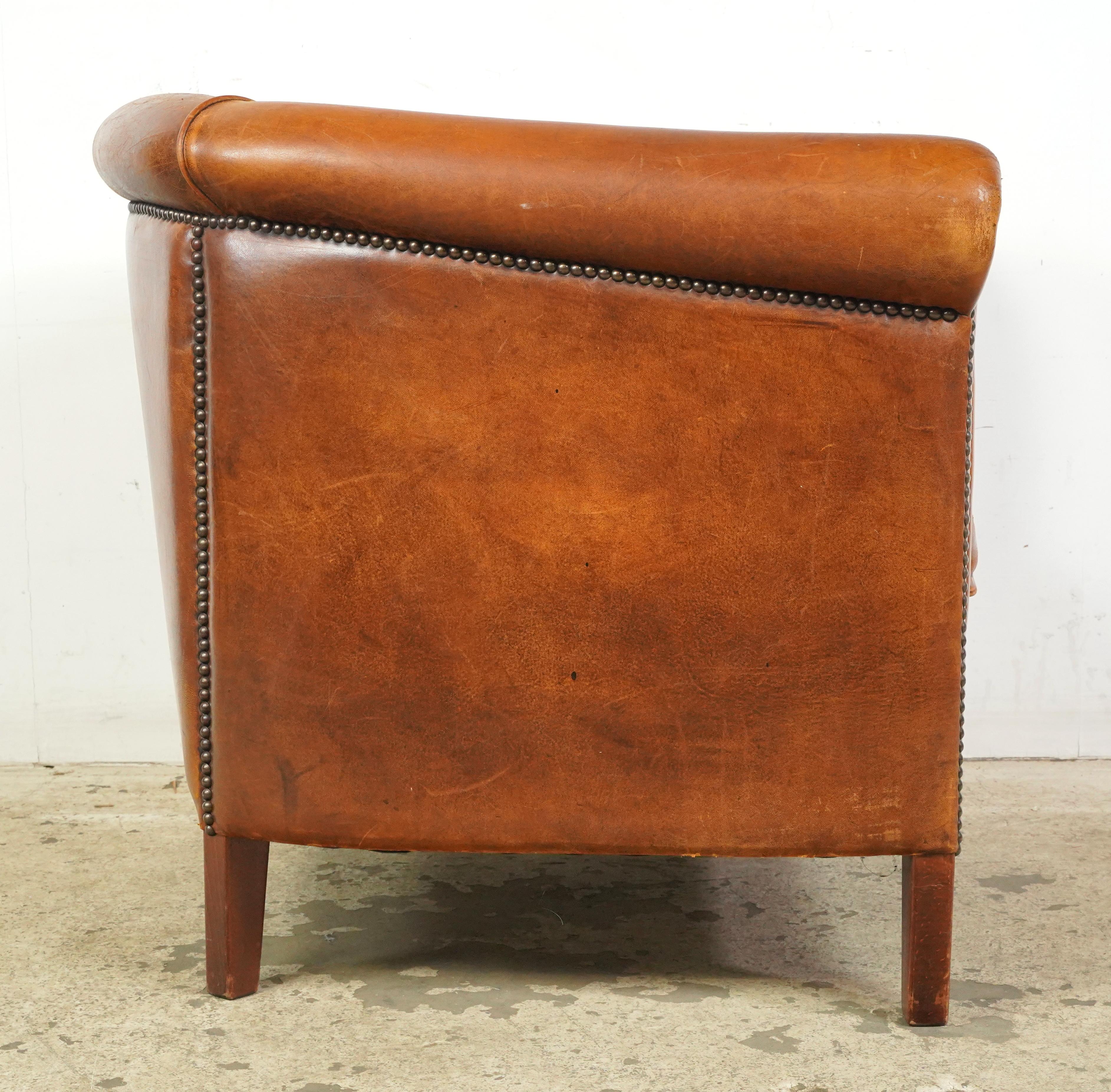20th Century European Studded Brown Barrel Leather Club Chair For Sale