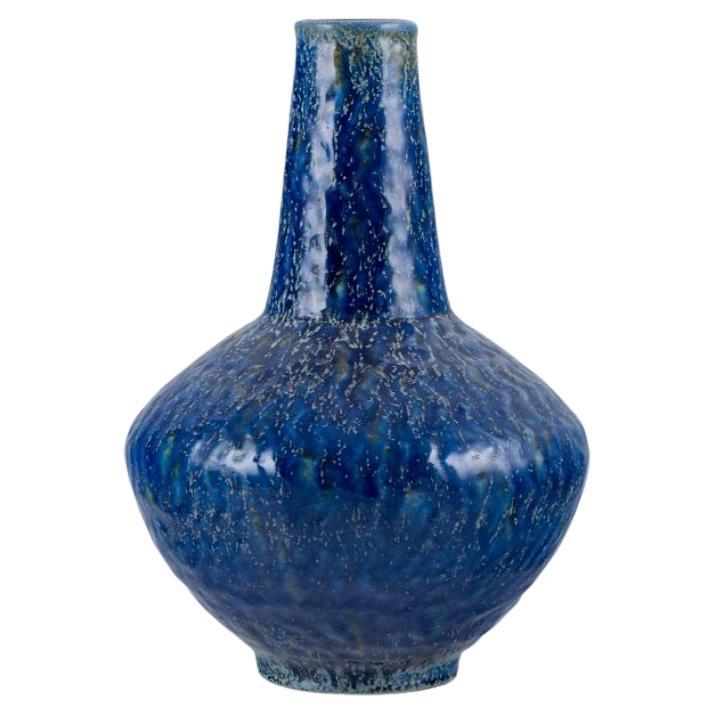 European studio ceramic artist, large ceramic vase with blue glaze.