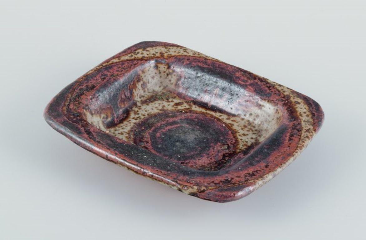 Unknown European studio ceramic artist. Unique ceramic bowl with brown glaze. For Sale