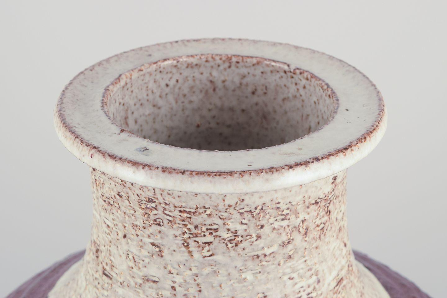 Unknown European studio ceramicist. Ceramic floor vase with flowing glaze. 1960s/70s For Sale
