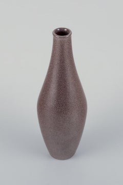 European studio ceramicist, ceramic vase with speckled glaze in brown tones.