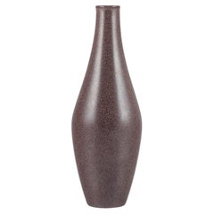 European studio ceramicist, ceramic vase with speckled glaze in brown tones. 