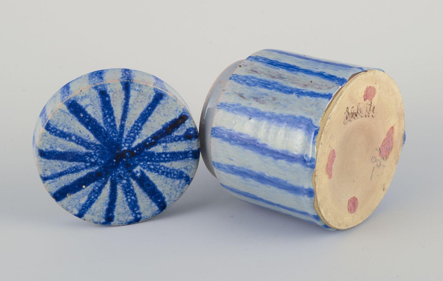 Earthenware European studio ceramicist. Lidded jar made of earthenware. Striped design For Sale