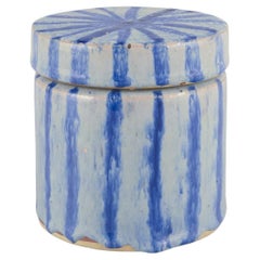 European studio ceramicist. Lidded jar made of earthenware. Striped design