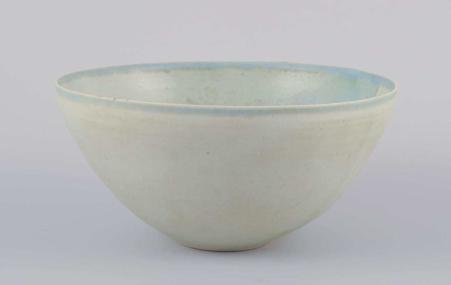 Pre-owned goods are exempt from import duties for U.S. customers. 
Therefore, no import tariffs will be applicable to your purchase.

European studio ceramicist.
Unique stoneware bowl. Hand-glazed in light tones.
Illegibly signed.
Late 20th