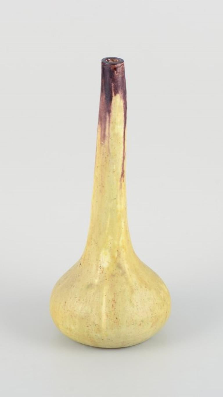 Mid-Century Modern European studio ceramicist. Tall narrow-necked ceramic vase. 1960s For Sale
