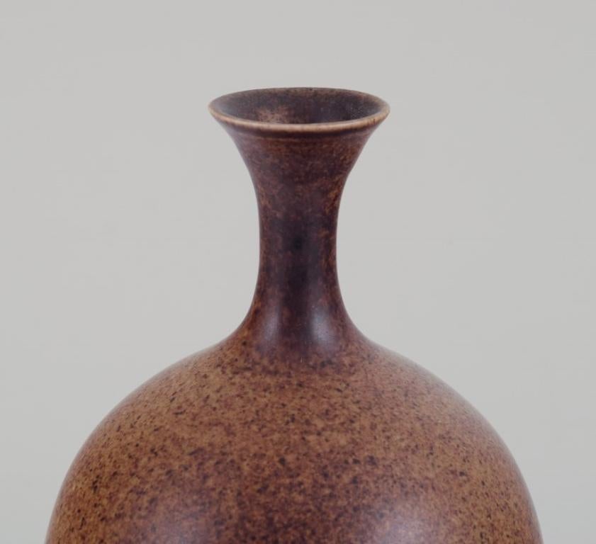Ceramic European studio ceramicist. Two unique ceramic vases. Glaze in sandy tones.  For Sale