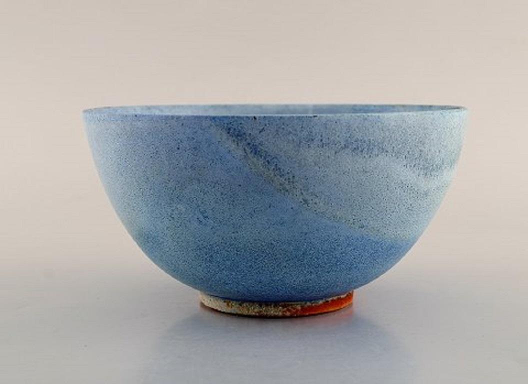 European studio ceramicist. Unique bowl in glazed ceramics. Beautiful glaze in light blue shades, 1980s.
Measures: 15 x 7.5 cm.
In very good condition.
Signed.