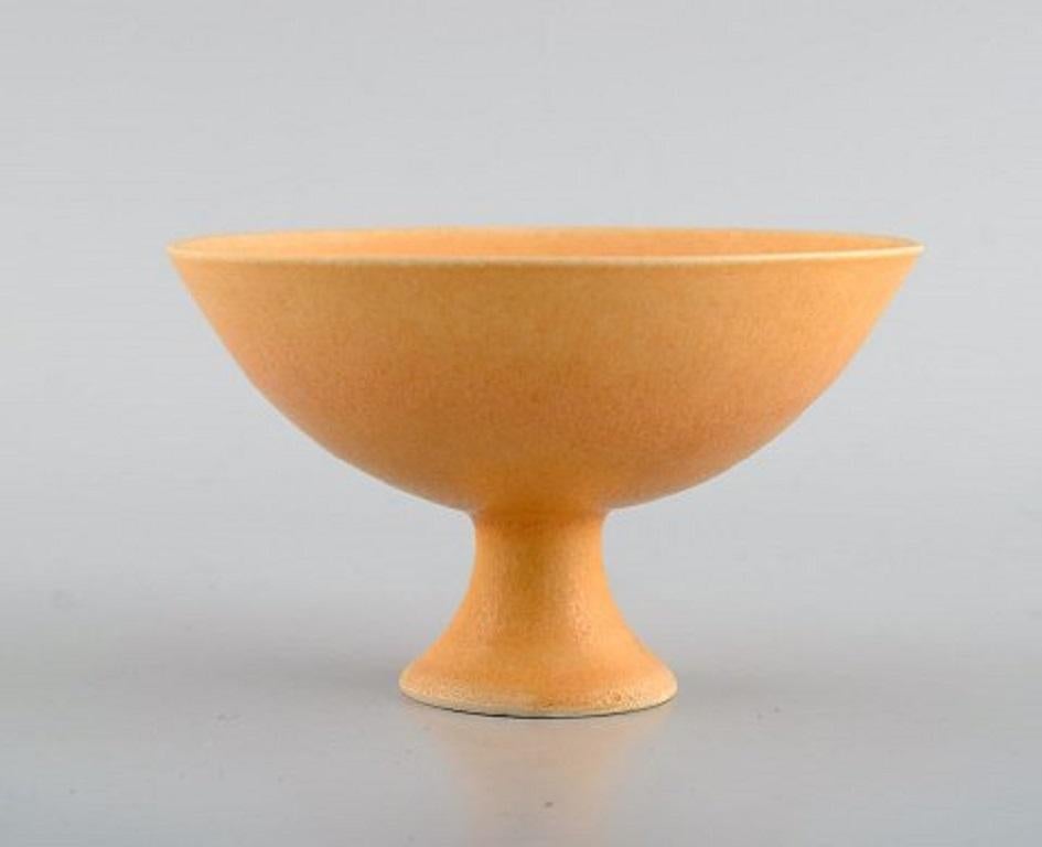 European studio ceramicist. Unique bowl on base in glazed ceramics. Beautiful glaze in light yellow shades,
21st century.
Measures: 12 x 7.3 cm.
In excellent condition.
Signed.